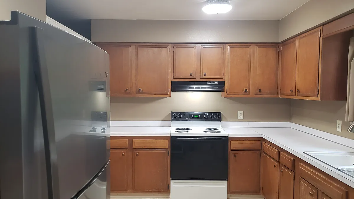 Huge kitchen! Ton of storage and counter space! New floor as of Oct 2025. - 1383 Brentwood Dr
