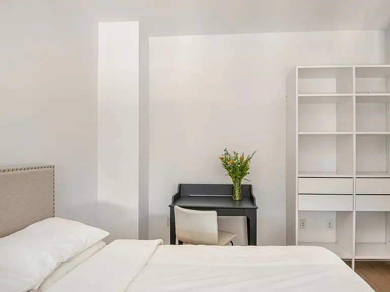 the closet area has additional hanging space not pictured