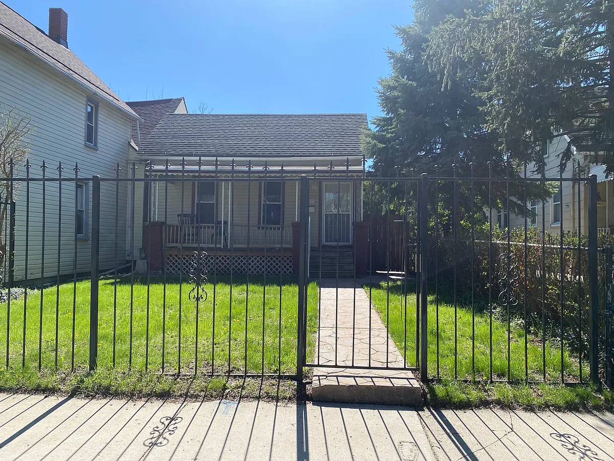 Gated front. Home set back from road on a quiet street. - 1989 25th St