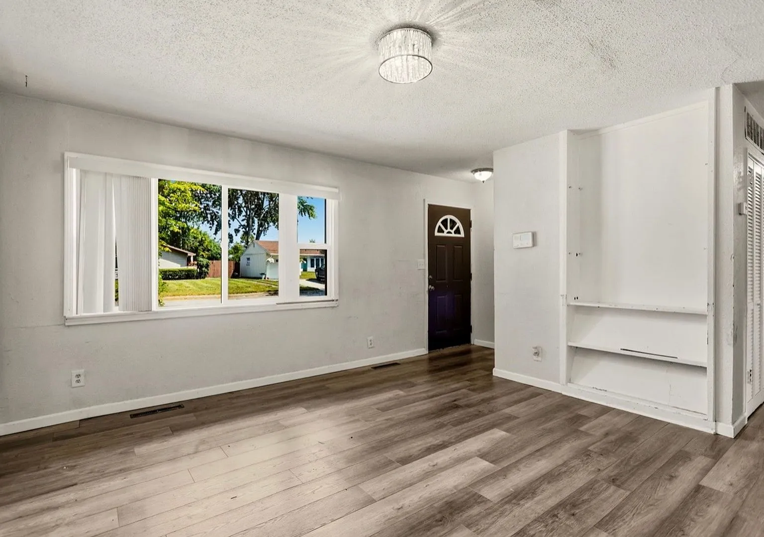 Freshly Updated 3-Bedroom Home with New Flooring! — Photo 2