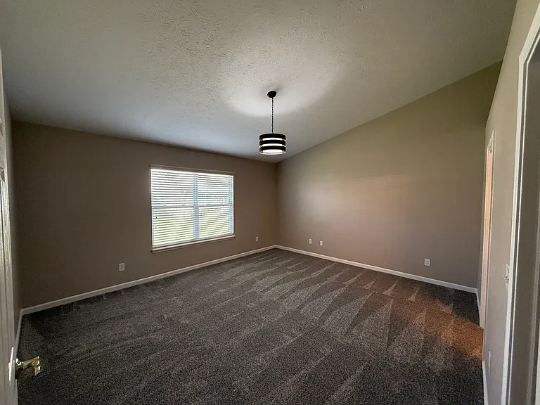 Master Bedroom with vaulted ceilings.