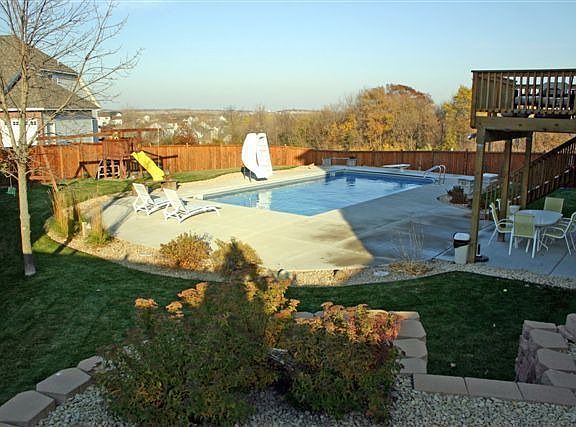 Beautiful inground pool and landscaping