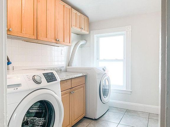 Separate laundry & storage room