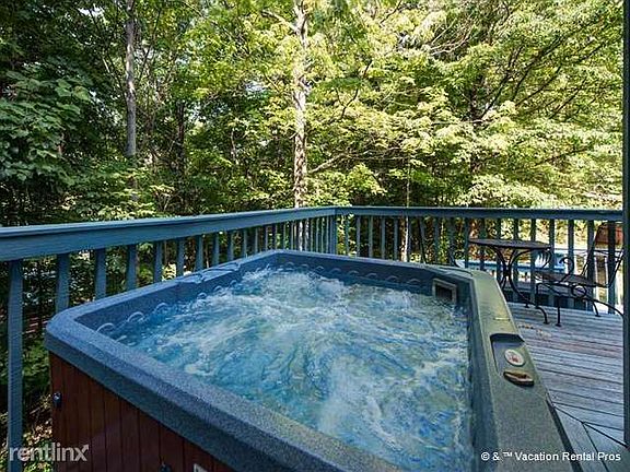 Revel in the hot tub day or night