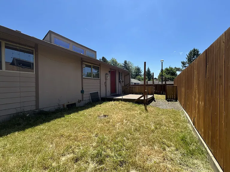 Bright and Airy Home with Stainless Steel Kitchen, Vaulted Ceilings & Washer + Dryer — Photo 48