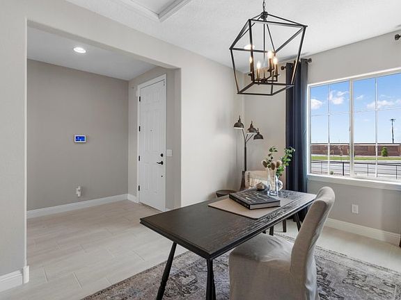 The den off the front door entry makes a nice space for a home office or create your own hobby or ki