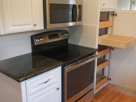 Range and cabinet pantry roll out drawers