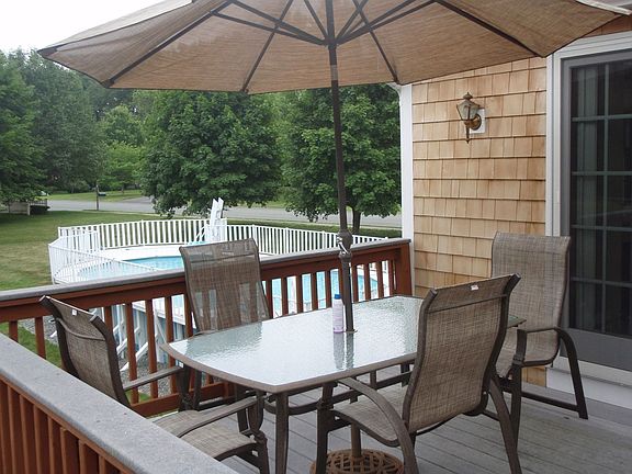 Deck overlooking backyard