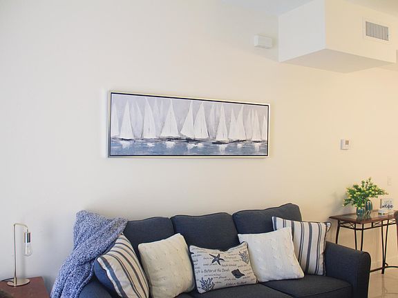 This comfy sofa that opens up as a bed if needed allowing extra guests to sleep.