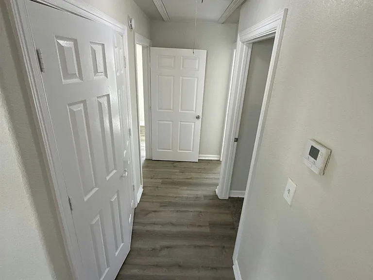 Hallway to 2 & 3 bed & Bath
