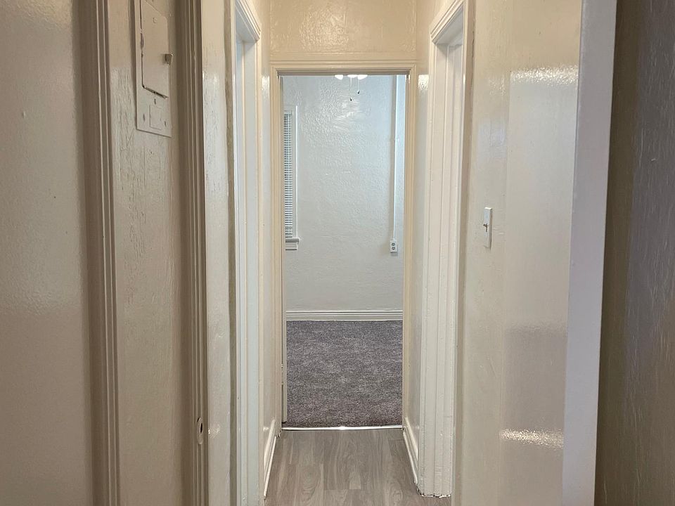 Hallway standing by first bedroom
