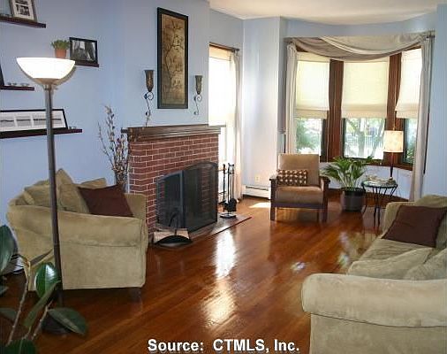 Living Room: Yes, fireplace works! Real hardwood floors. Elegant 10' ceiling.