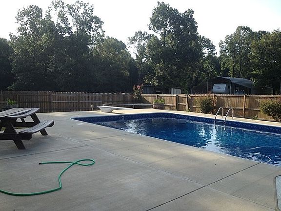 In ground chlorine pool.