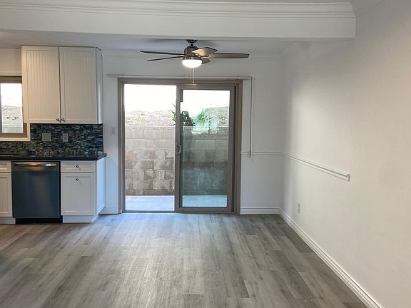 Large dining area opens onto gourmet kitchen and backyard