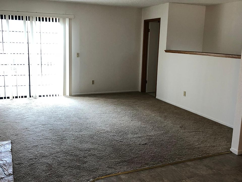 Living room and slider to elevated deck