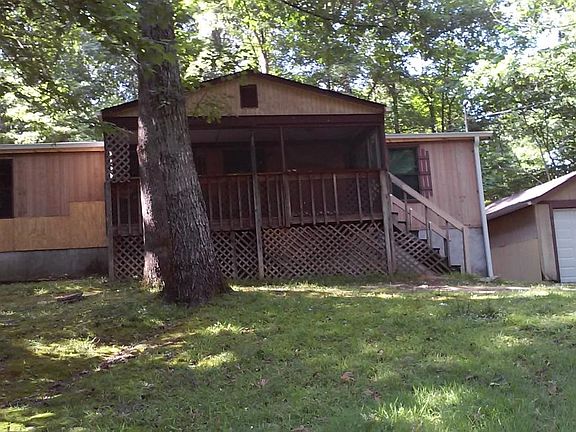 detached garage on right