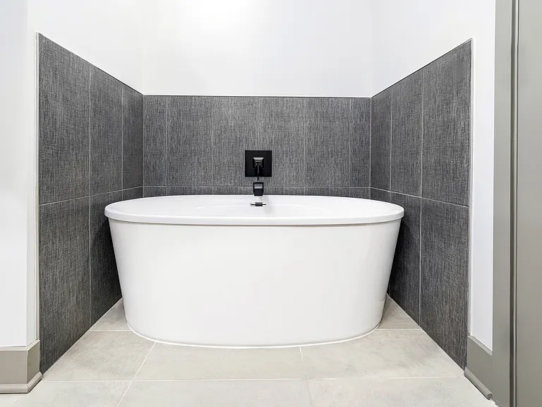 Indulge in luxury at Modera Riverview with serene bathrooms boasting spa-like soaking tubs.