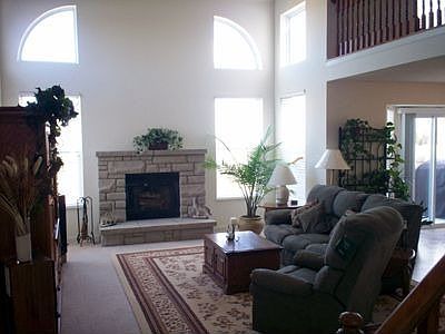 2 story great room with a full wall of windows
