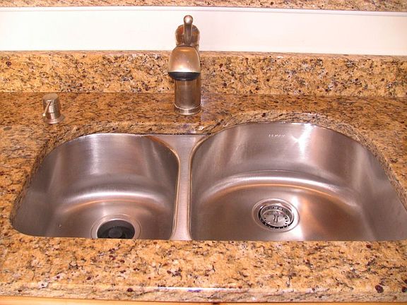 undercounter mounted sink with Moen faucet