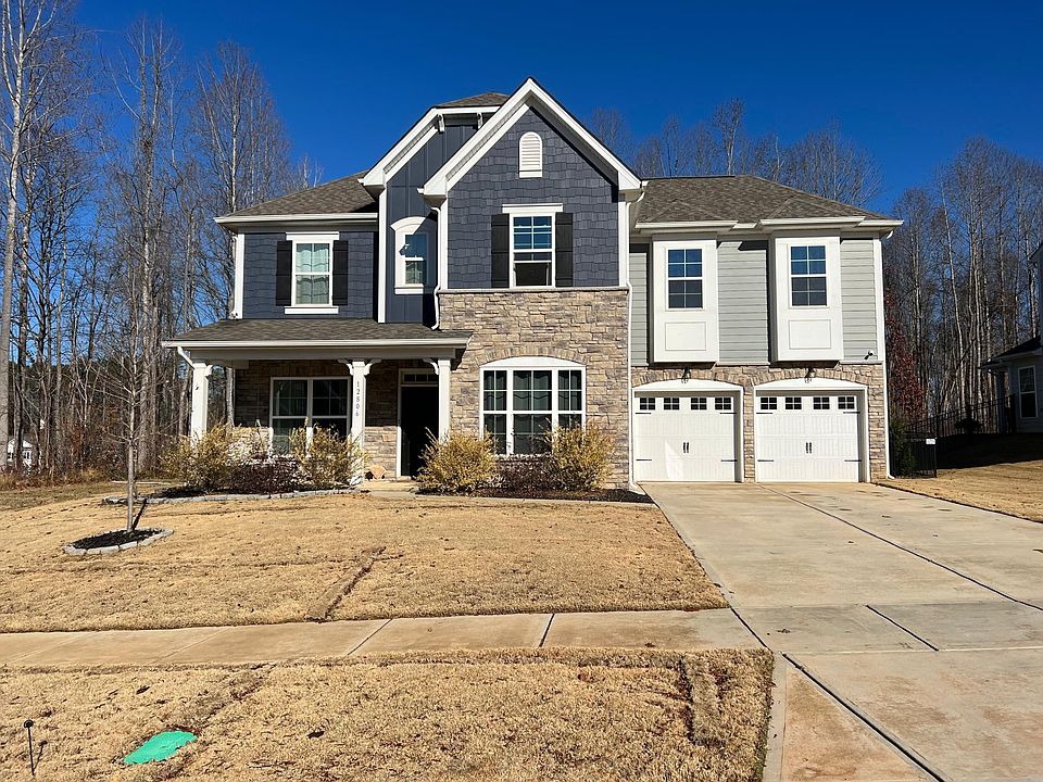 2 year young Exquisite Home located on corner lot in Farrington neighborhood.