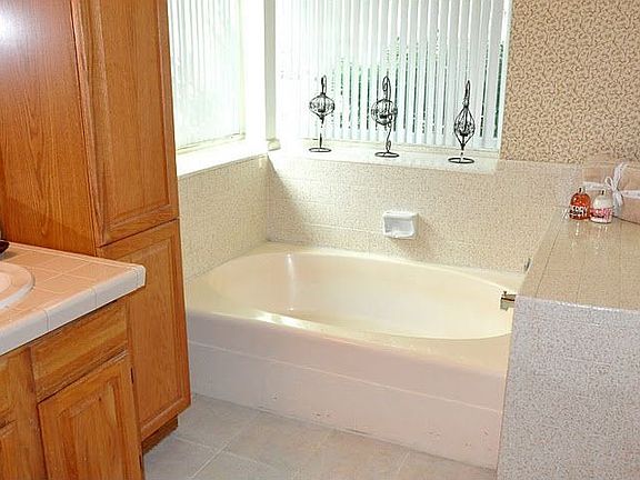 The master bathroom has lots of natural light