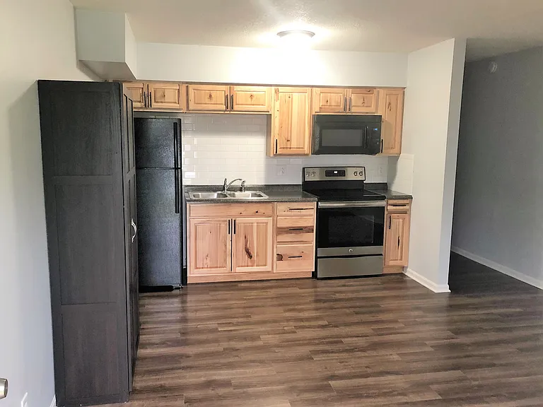 Kitchen includes Microwave, Oven/Range, Fridge