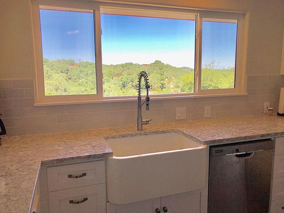 Country sink with enlarged window, great view of the hill side