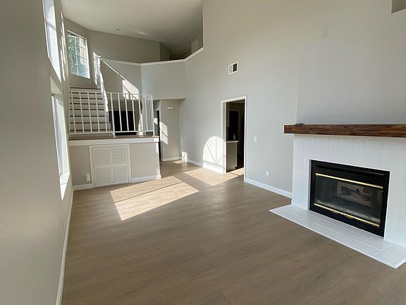 Living area with vaulted ceilings
