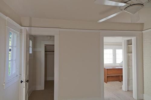 Main bedroom with closet and office