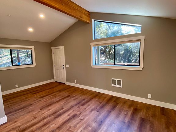 The cottage entry foyer is on the left, with a portion of the great room on the right.