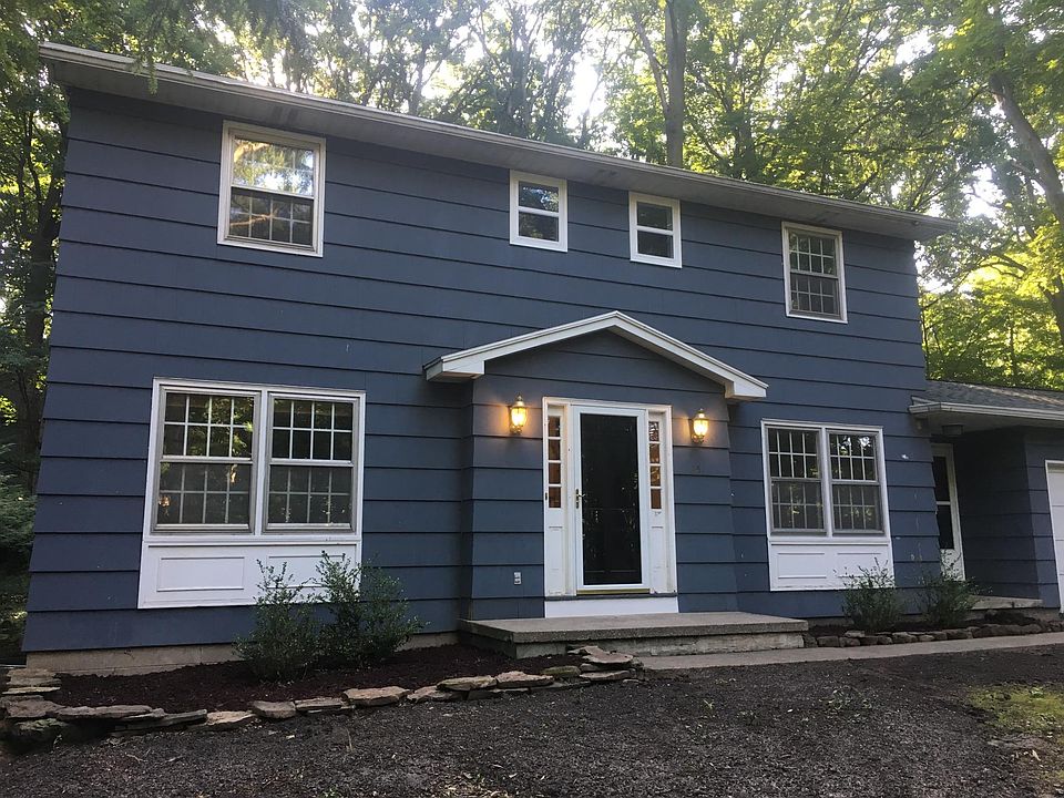 Four-bedroom home with wooded lot