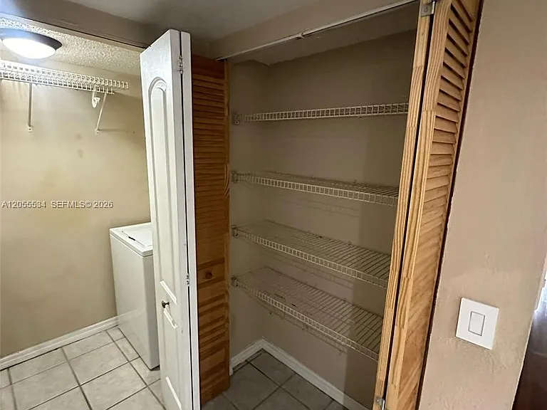 5035 Wiles Rd #203 — Photo 17