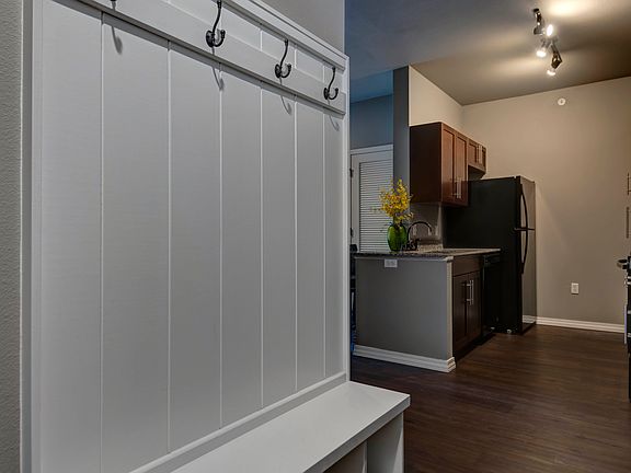 Verandas apartments entryway with coat hooks