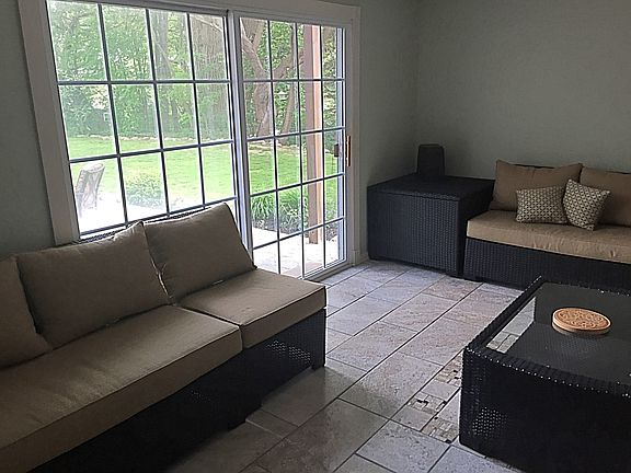 Sun room leads to patio