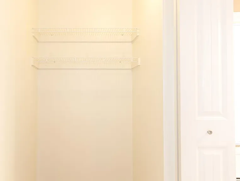 Wire shelving in some closet units