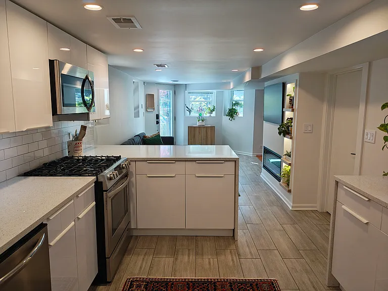Kitchen area looking toward living room.