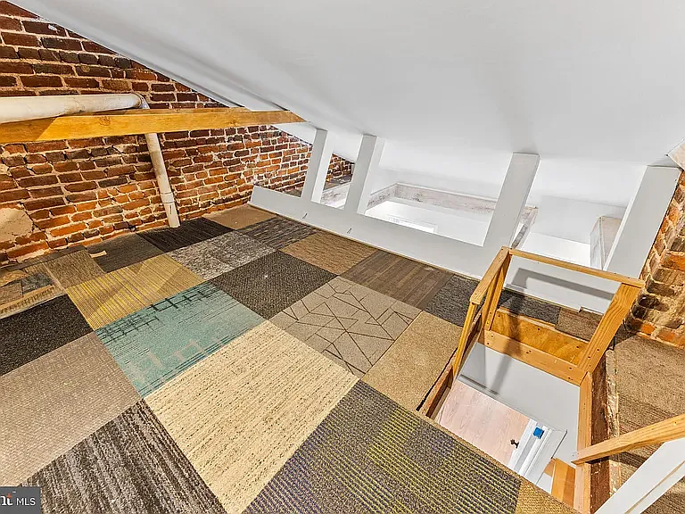 Loft/storage space in second bedroom.