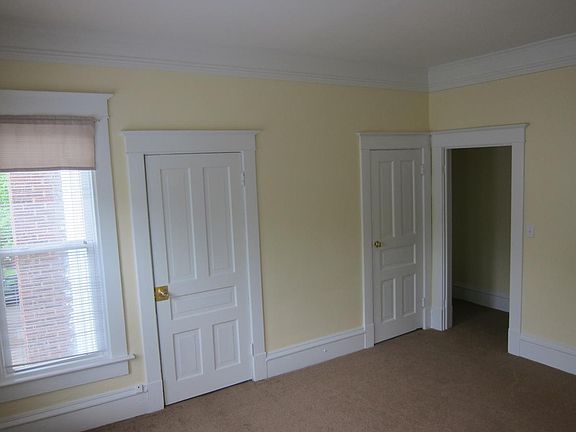 Another view of the family room. The door on the left leads
