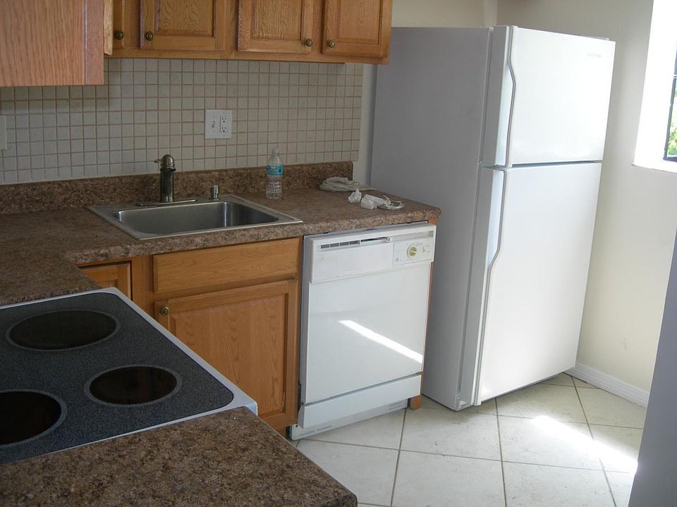 1st image of 103 Gardens Dr APT 203