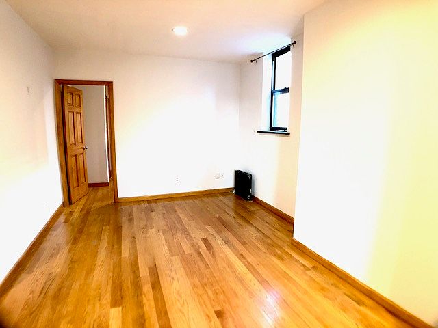1st image of 120 E 1st St APT 6