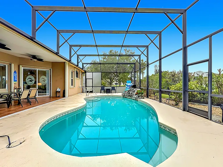Outside Pool Area with Screen Enclosure