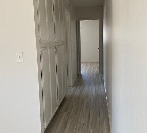 bedrooms located away from living room and kitchen for more quiet.
