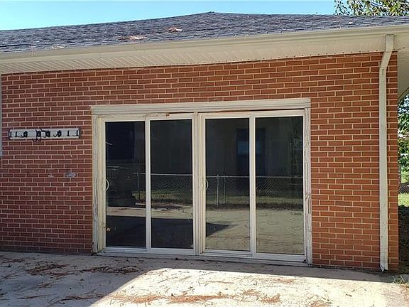 Large addition rear of home. Great for in law suite - large great room, bath and kitchen area. Presently blocked from main home - but wall can easily be removed.