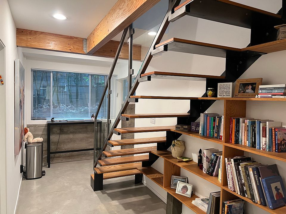 Lower Level Hall, Stairs & Built-in Bookcase