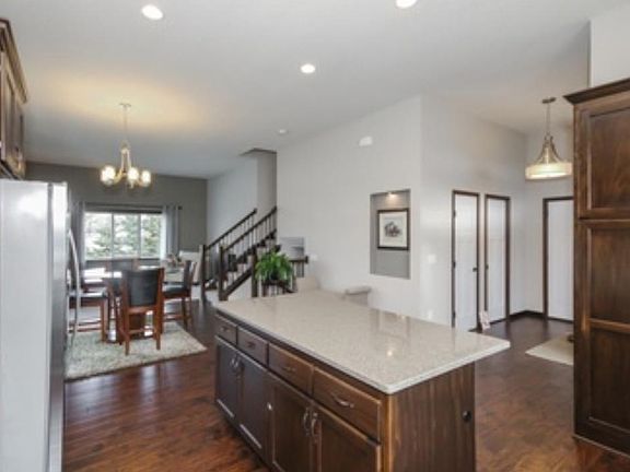 This kitchen is so inviting for all the entertainment and meal preparation!