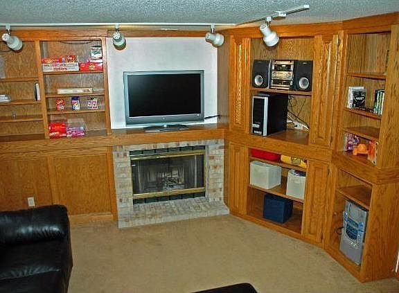 Family room with wood burning fireplace