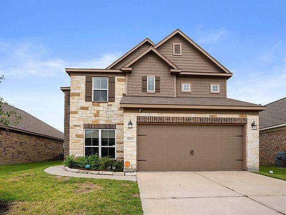 Dual wide driveway leads to a 2 car garage. The home features all sides brick, which makes it aesthetically pleasing and easy maintenance.