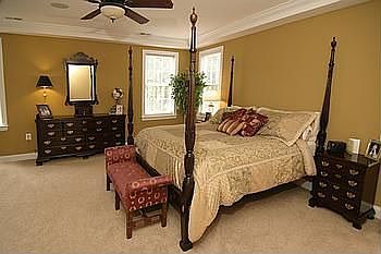 Master Bedroom w/ Walk In Closets & Sitting Area