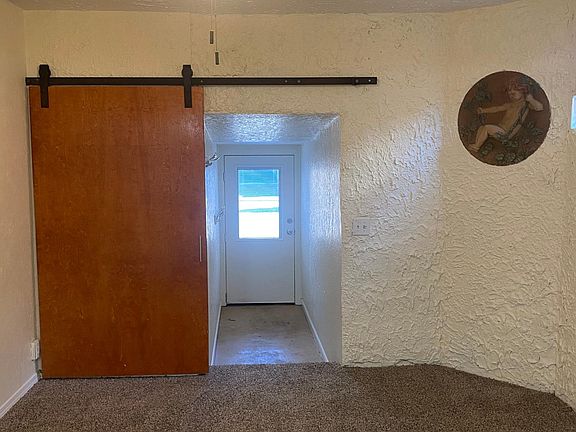 Looking from kitchen to outside door.