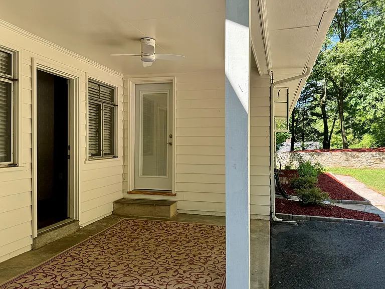Back porch, (open) door to Den; door to Kitchen.